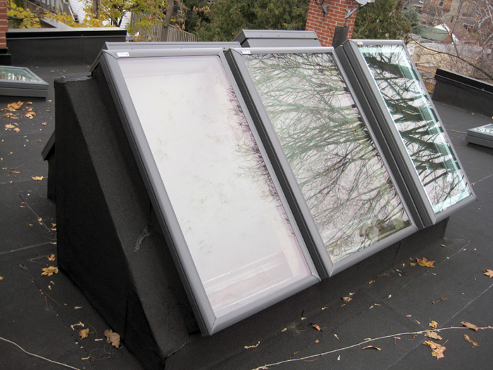 Flat roof Velux skylight toronto installation.